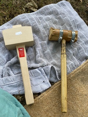 Two wooden hammer.